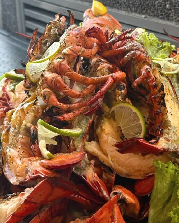 Grilled lobster platter served at a Shiok BBQ event, Singapore