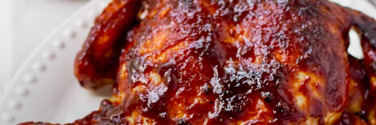 Whole barbecued chicken in a glossy dark glaze from Shiok BBQ in Singapore