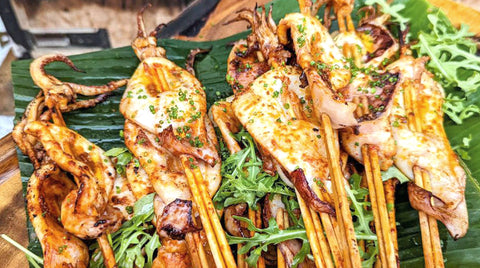 Grilled squid and satay skewers on banana leaf, Shiok-Down Showdown package, Shiok BBQ Singapore