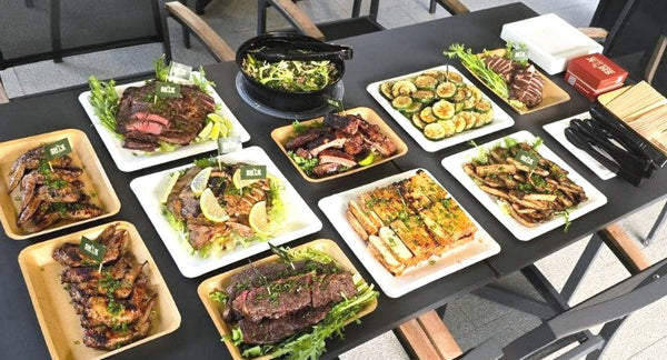 Table spread of grilled meats and sides, Seriously SHIOK Wishlist BBQ Package, Shiok BBQ Singapore
